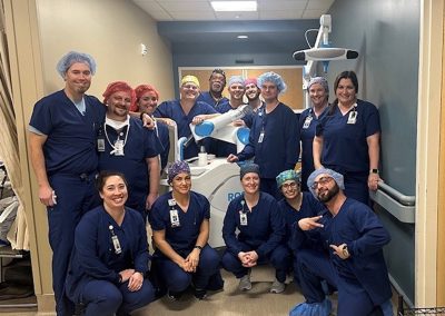 Dr Ballard with other co-workers celebrate 1,000 knee replacements