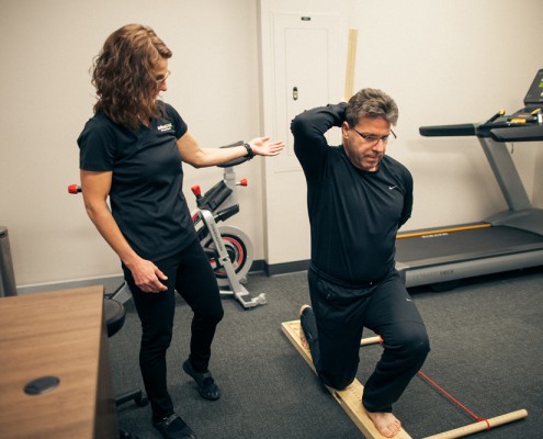 2 women doing yoga at a studio